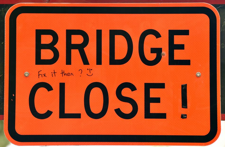 The person also left a message on the "bridge closed'' sign, asking the Dunedin City Council to fix the bridge.