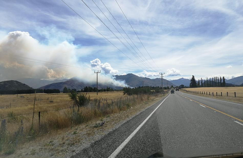 The fire seen from the Wanaka-Luggate Highway this afternoon. Photo: supplied