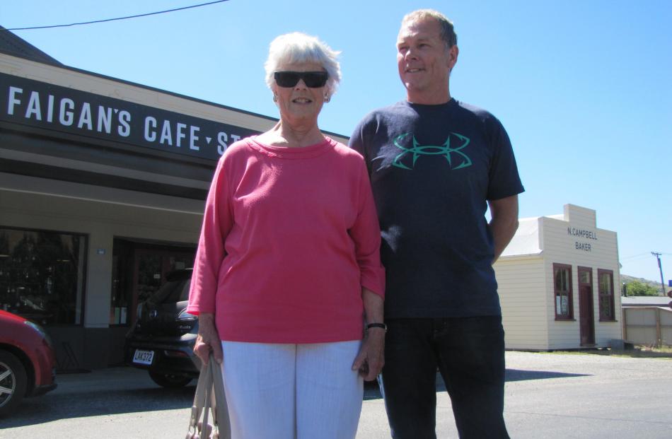 Rosslyn Wilson and her son Gary, both of Milton, are flanked by the repurposed Faigan's Cafe and Store and the Millers Flat Bakehouse. 