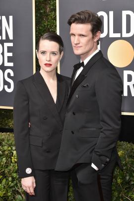 Claire Foy opted for a Stella McCartney tuxedo suit with Matt Smith, wearing Burberry. Photo:...