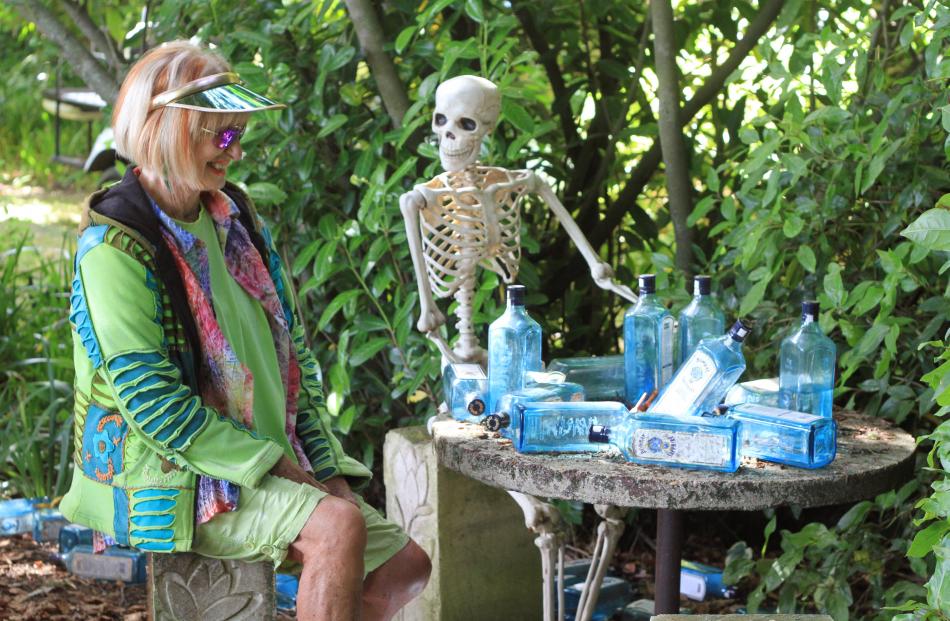 JJ Rendell and a gin-loving skeleton are set for a garden party. Photos: Hamish MacLean