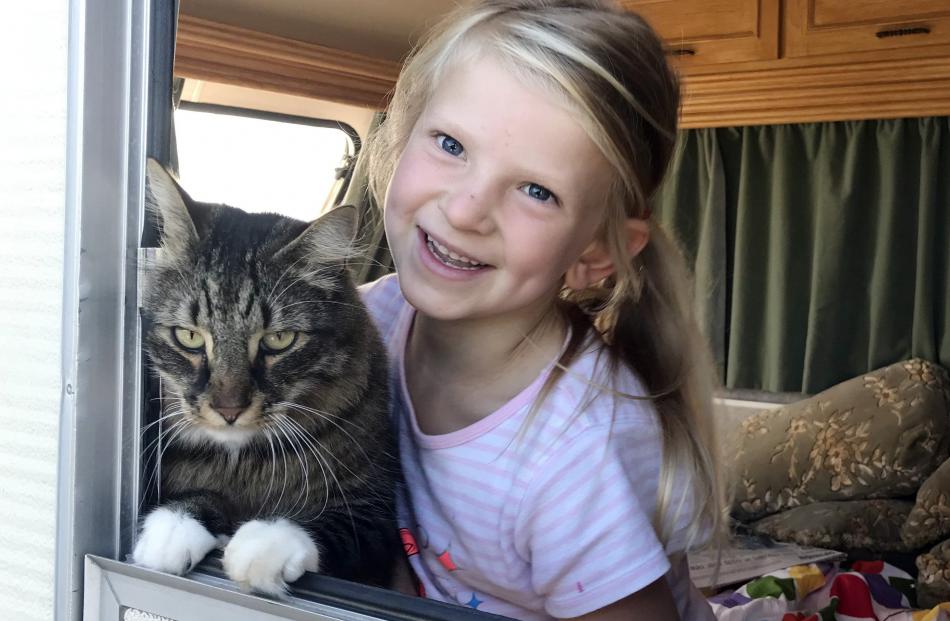 Amelia Claridge (6) and her best bud Jasper (4) hang out in the family’s new caravan in Oamaru....