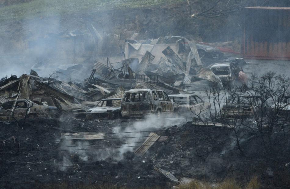 Area A - Cars, some in the process of being restored, were destroyed in the fire. Photo: Gerard O...