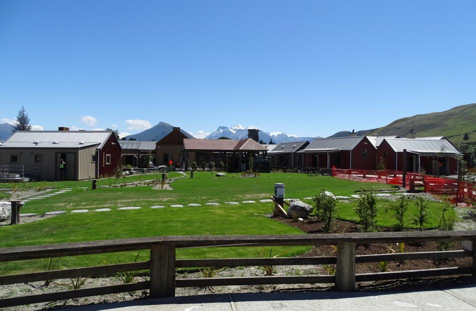 The Camp Glenorchy tent site, with cabins to the left, the main reception, amenities and ablution...