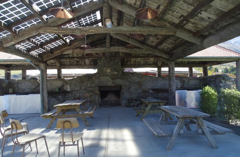 The  ‘‘Scheelite Shelter’’ at Camp Glenorchy features a fireplace made from locally sourced...