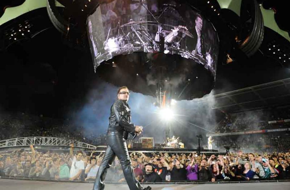 U2 work the crowd during the first Auckland show on their 360deg World Tour, on Thursday.