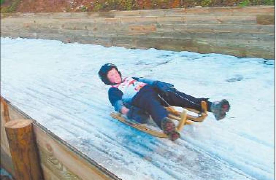 Speed thrills: Tyler Day on a run during his school holidays. Sleds can hit 70kmh on the fastest...