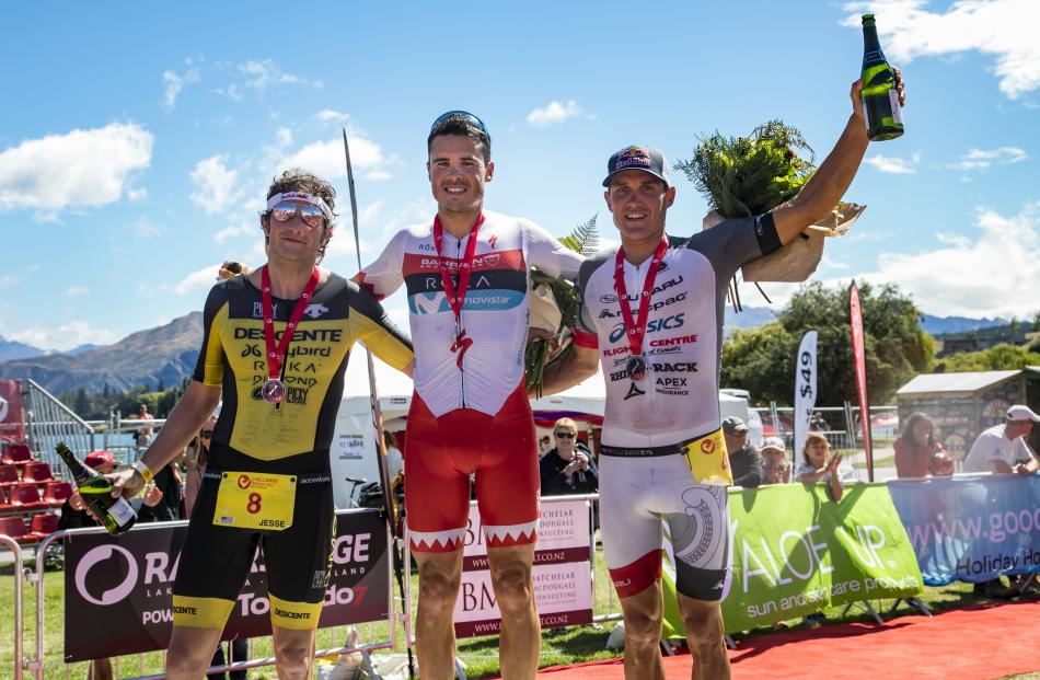 Third placegetter American Jesse Thomas (left), winner Spaniard Javier Gomez (centre) and runner...