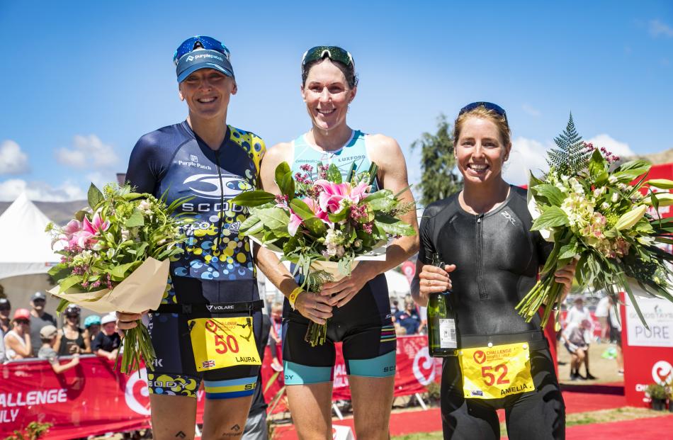 Runner-up Laura Siddall (left), of Britain,  winner Annabel Luxford (centre),  of Australia, and...