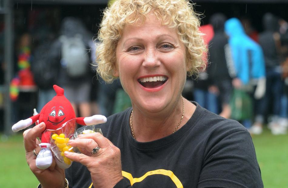 New Zealand Blood Service southern donor recruitment team leader Ali Keast shows off her wares at...