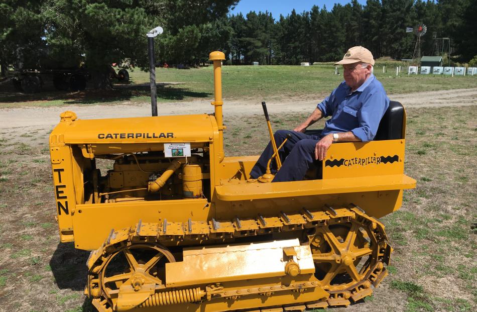 New Zealand Vintage Machinery Club (Canterbury) president Owen Neal sits in the 1929 Caterpillar Crawler 10 he’s owned since 1979.