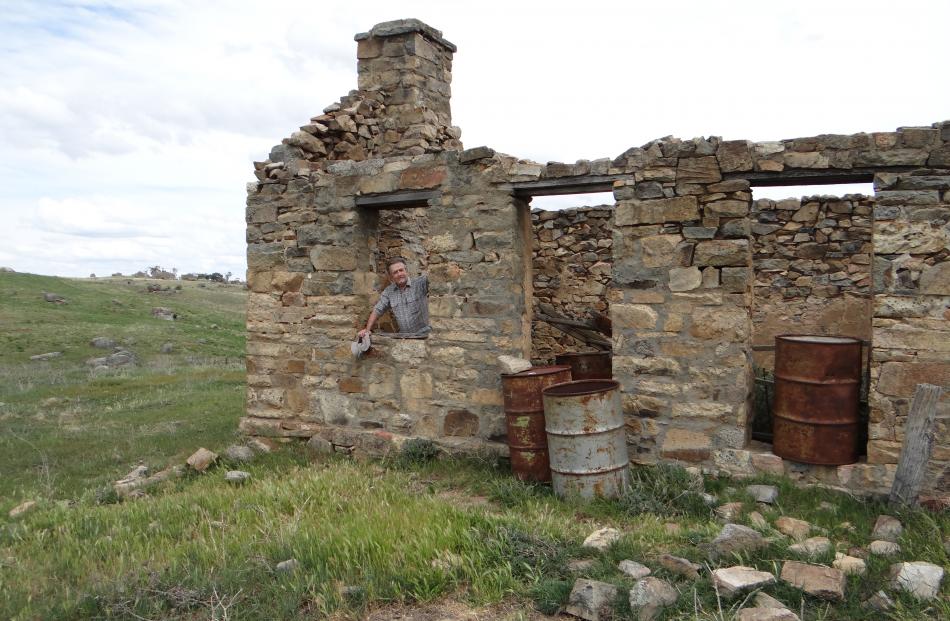 Mr  Healy on the hunt for a poltergeist in a haunted ruin near Hugundra, near Cooma, in Australia...