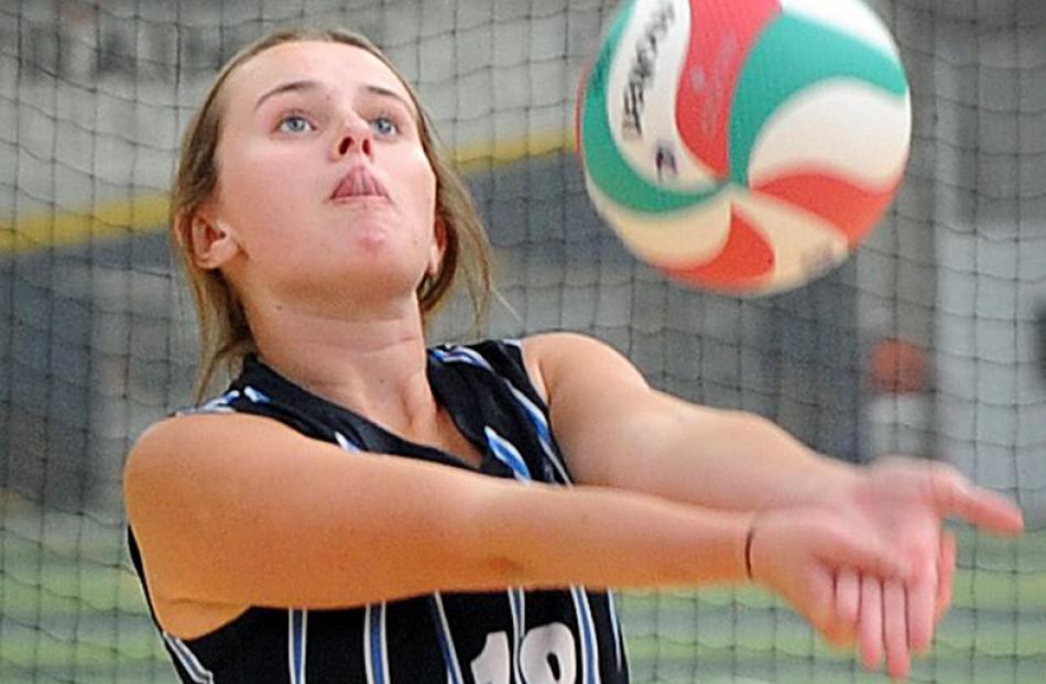 St Hilda's Collegiate player Sophie Allison concentrates as she plays the ball at the Otago schools' volleyball championships at the Edgar Centre on Saturday. Photos: Christine O'Connor