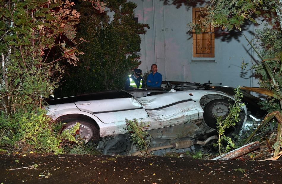 Two teens allegedly crashed into a Land Rover in Tomahawk Rd yesterday morning. Photos: Stephen...