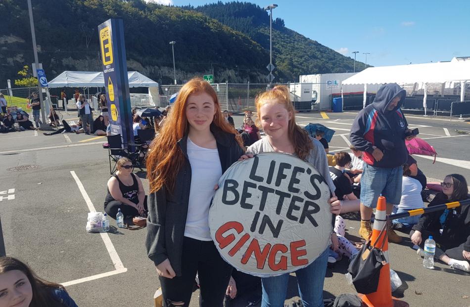 Annabelle(14) and Laura Ring (12), of Dunedin, waited in line overnight  to get a good spot....