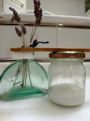 Home-made toothpaste and a bamboo toothbrush.