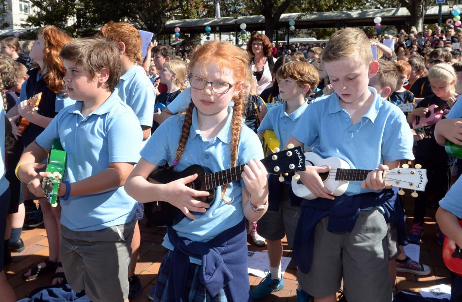 Waihola School pupils Michael Duthie (8, left), Evangeline Wiel (8) and Jack Girvan (10)...