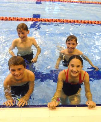 Make a splash . . . Balclutha pupils Cooper Cleland(10), Eddie Burgess (10), Leo Burgess (9) and...