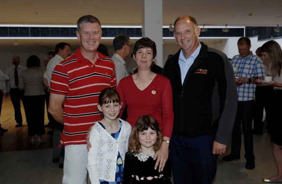 Paul Sharp (Red Cross), Clair Robertson (Red Cross/Civil Defence)  with her daughters Heather (9)...