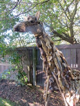 Greg Powell’s favourite creation  is his giraffe. Photo: Toni Williams