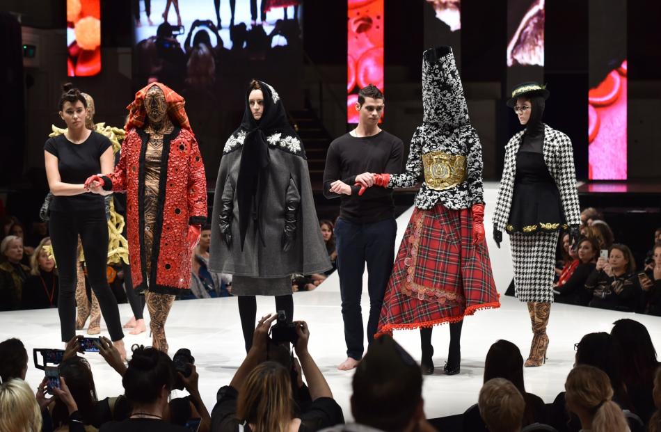 Models wear design creations by 2018 iD International Emerging Designer Award winner and...