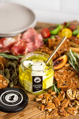 Helen and Richard Dorresteyn, of Clevedon Buffalo Co, love nothing more than spreading some of their marinated mozzarella on a cracker.