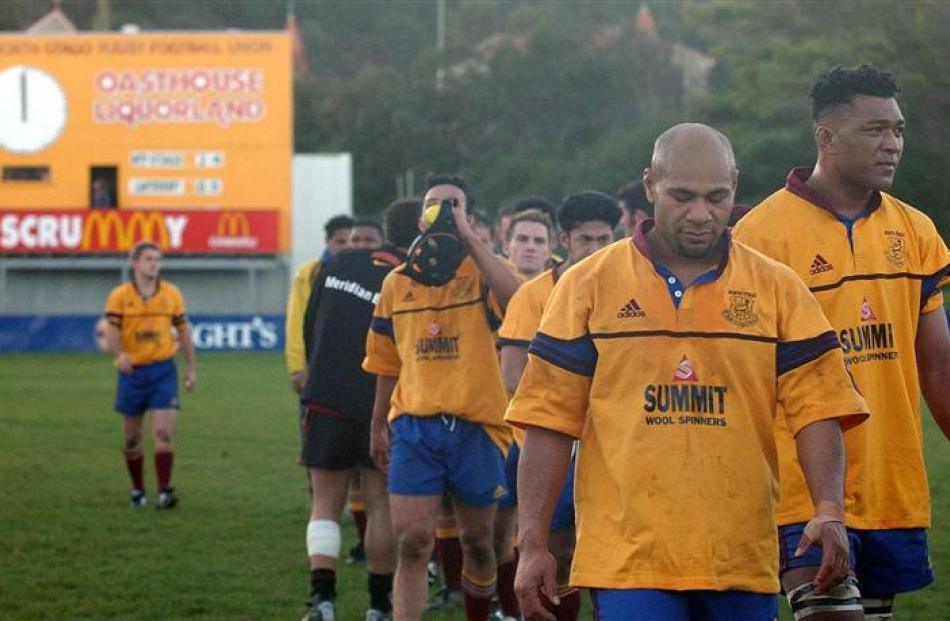 Players leave the field after the unsuccessful challenge against Canterbury in 2003. ODT file photo.