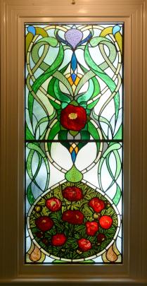 Peonies feature in the new stained-glass window in the stairwell.