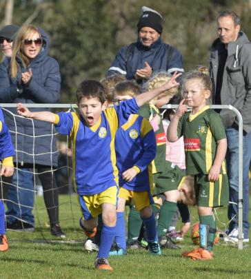 Melchester Rovers player Jack Weatherall (5) is pleased he  scored a goal against Green Island. 