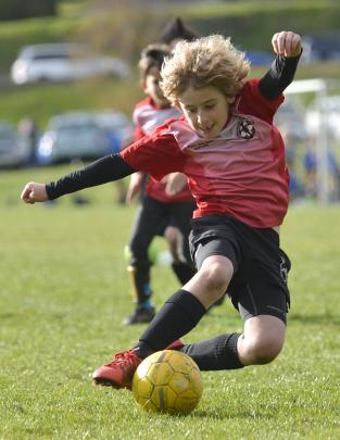 Harbourside Rays player Archie Morrell (7) gets into the spirit of the tournament. 