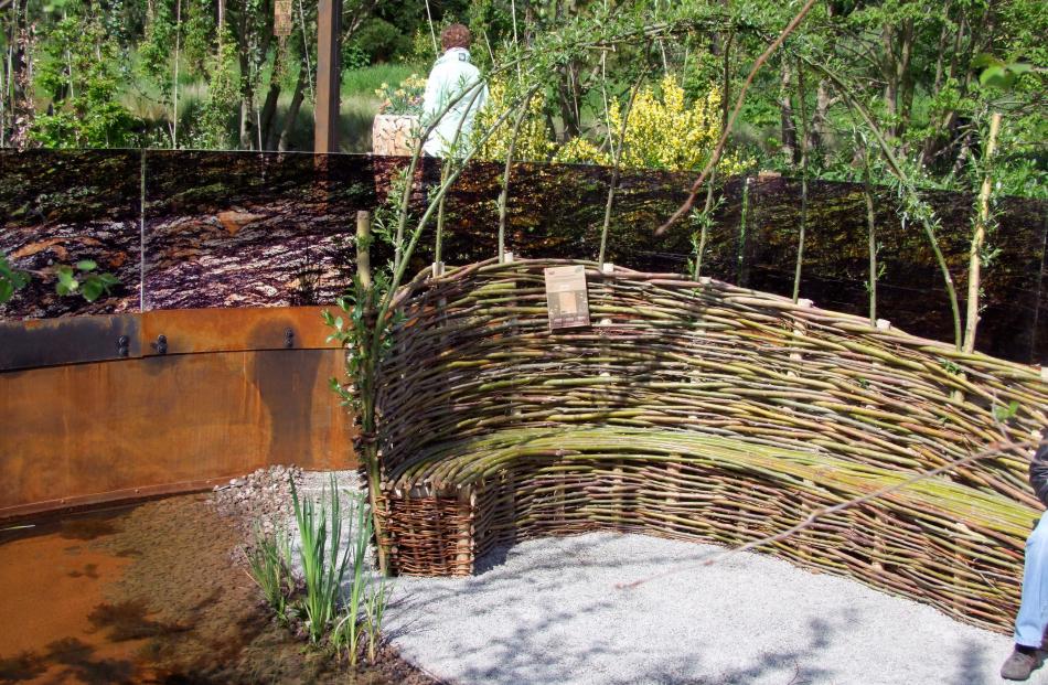 An outdoor willow seat whose growing branches will eventually form a canopy. Photos: Gillian Vine