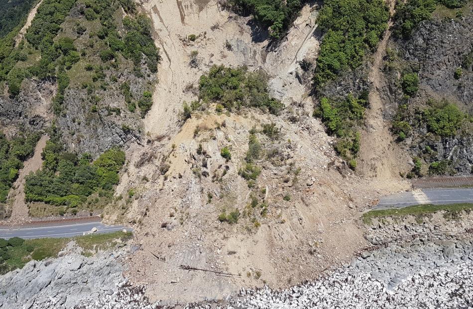 Queenstown may be isolated after a major rupture of the Alpine Fault by landslips like this one, which blocked State Highway 1, north of Kaikoura, in 2016. Photo: Mark Mitchell