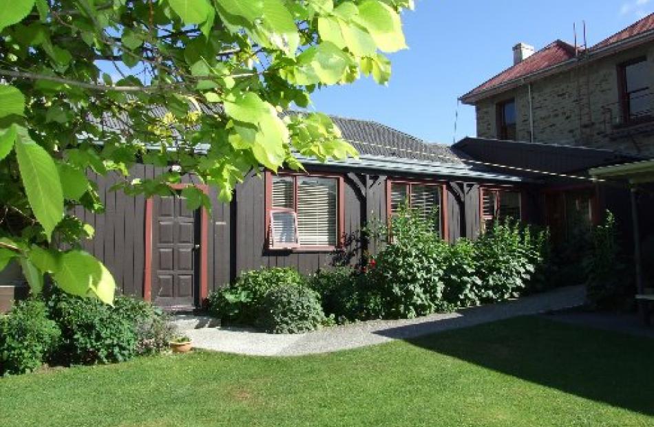 The stables open out on to the garden at the rear of Dunstan House.