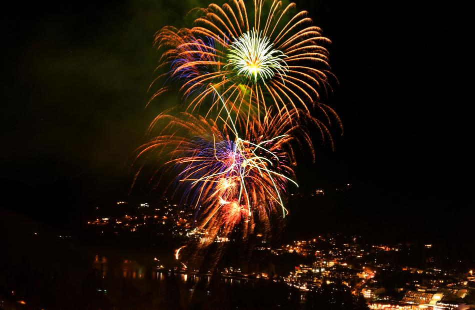 The fireworks display lights up Queenstown last night. 