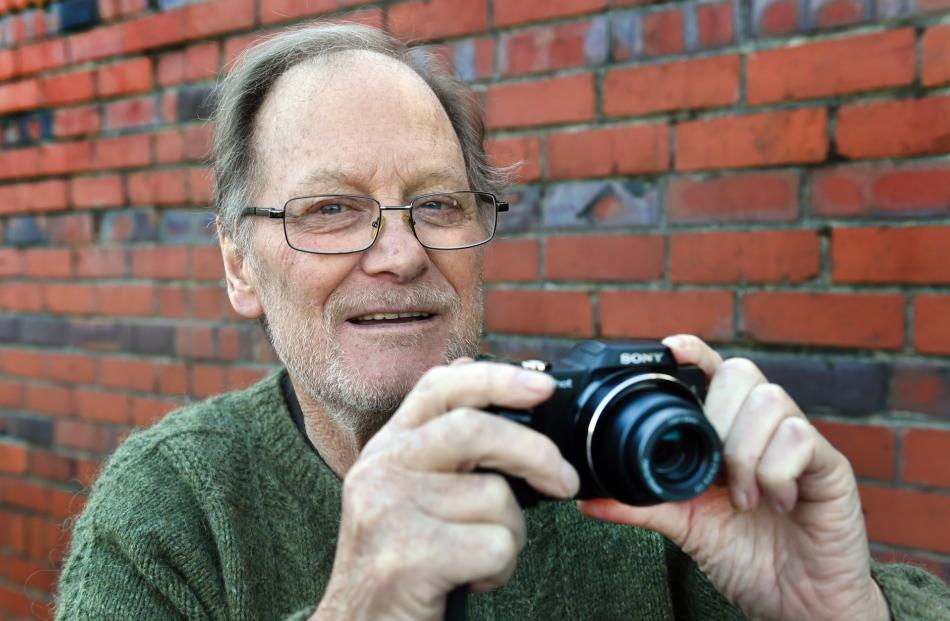 Dunedin poet Peter Olds no longer has his faithful Pentax SLR but uses this compact digital...