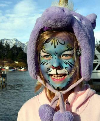 Little tiger . . . Ruby Goodall (9), from Invercargill, sporting a free face paint at the...