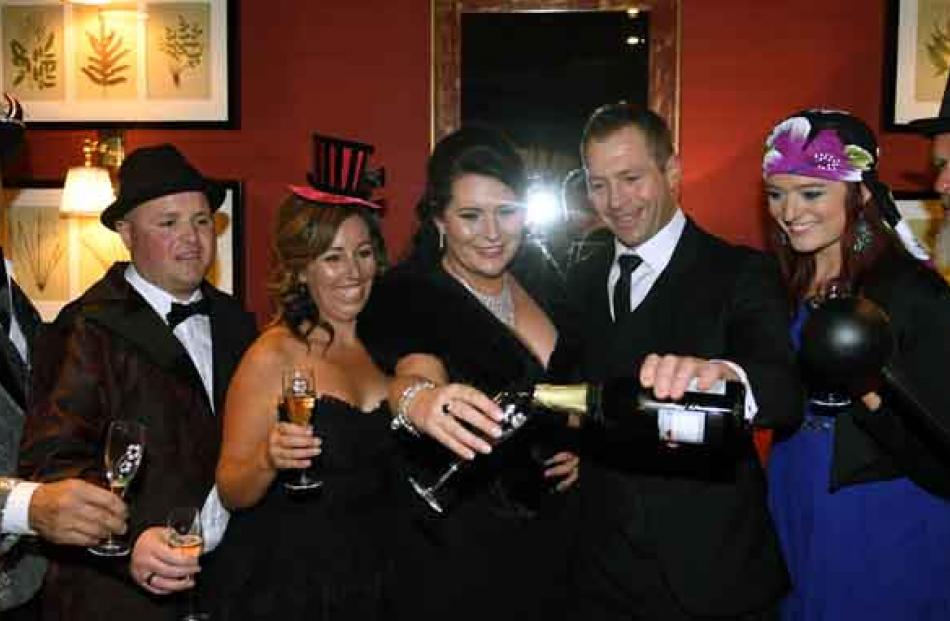 Lets have a ball . . . Having pre Skycity Ball drinks on Friday night at the Sofitel are (from...