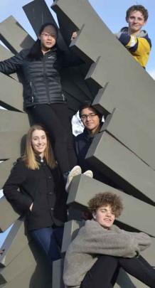 Winners: Logan Park High School band Solid Merit members (from top:) Finn McKinlay (16), Cathy...