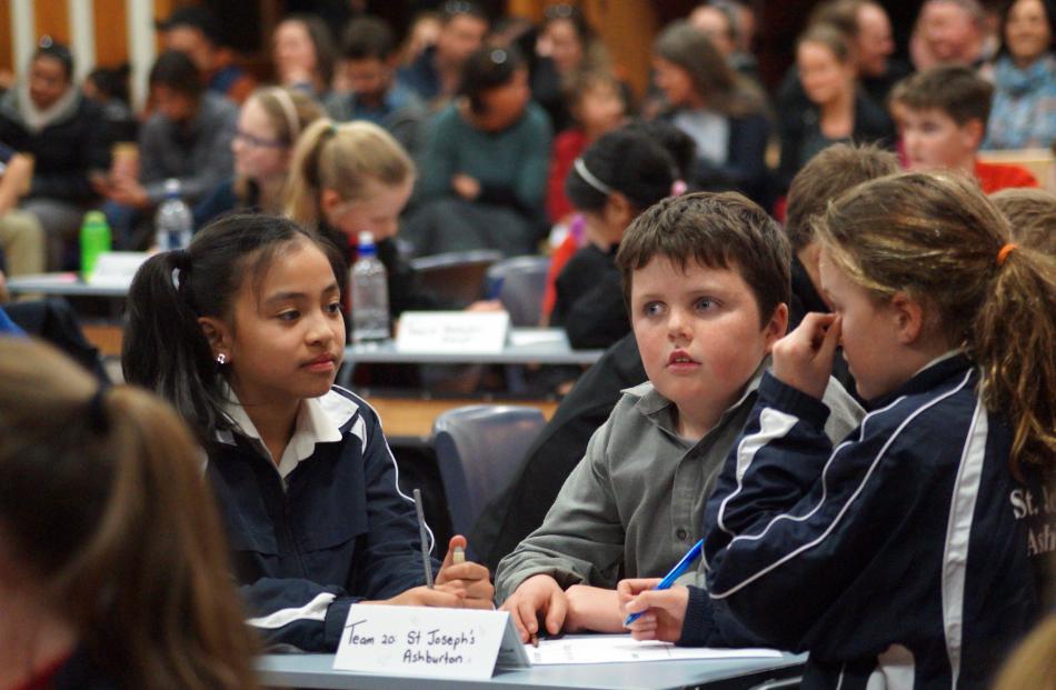 St Joseph's Ashburton pupils (from left) Sophia Aguila (11), Brendan McCrea (10) and Phoebe...