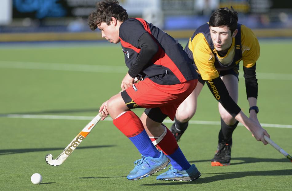 Josh Dent (South Otago High School) is challenged by Richard Scott (Tokomairiro High School)...