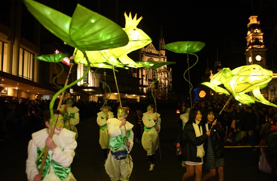 Frogs and lilies enchant the crowd at the Dunedin Mid winter parade.