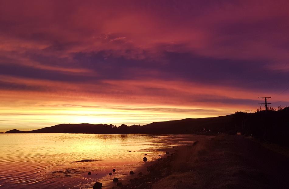 Sunrise taken fron Harwood looking out towards Taiaroa Head. Photo: Leah Dawson