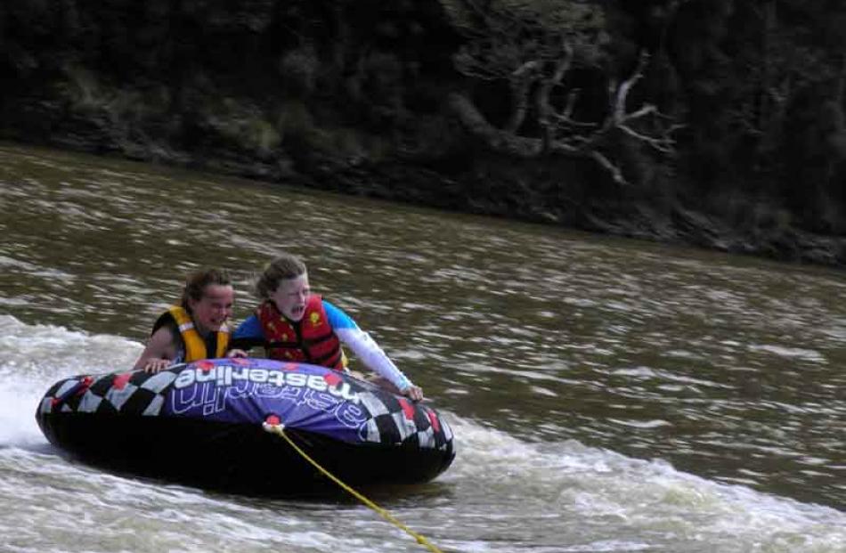 The face says it all . . . Emma Dunn (11) and Alisha de Groot (12) biscuit riding at Taieri Mouth...