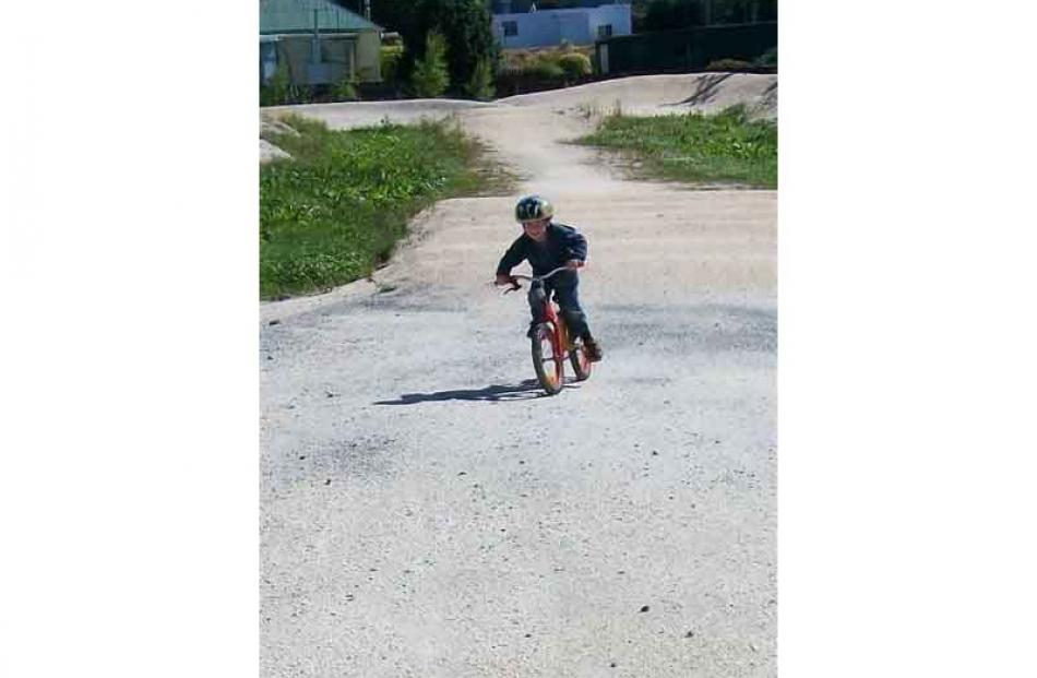 Gaining speed... Callum Brown from Balclutha aged 4 riding his bike at the Kaitangata BMX Track...
