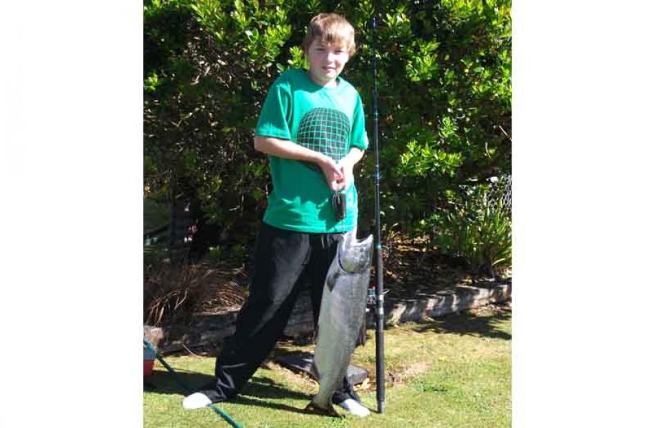 Cameron Donaldson (12) of Fairfield caught this 5.5kg salmon from their boat, just off the...