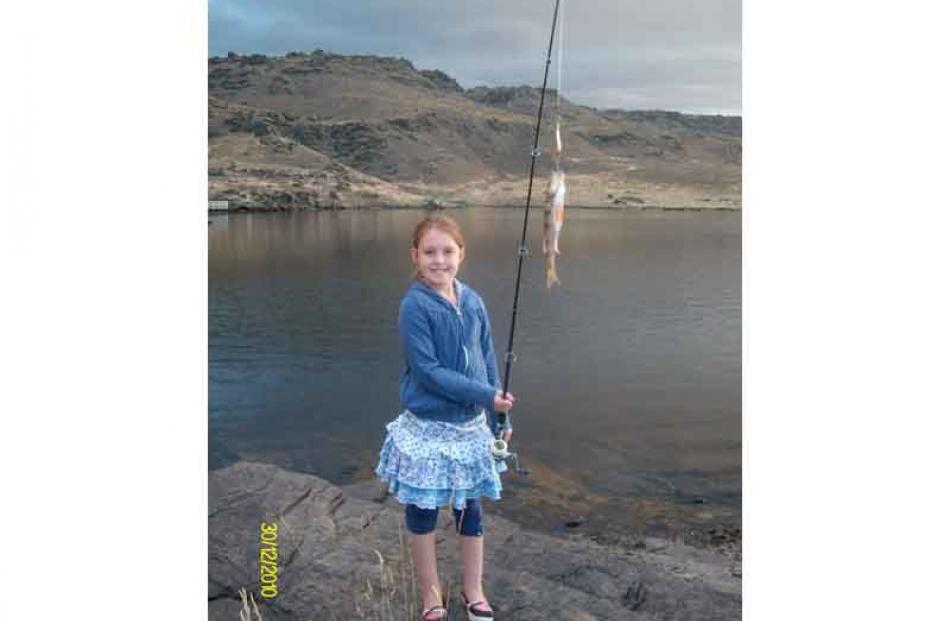 My first fish . . . Amber Mowat-Jopson (8) at Butchers Dam, near Alexandra, on December 30. Photo...