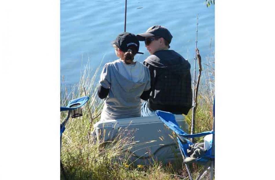 Kate Smaill (9) and Jack Fielding (10) fishing at Kelland Ponds near Twizel on 29 December 2010...