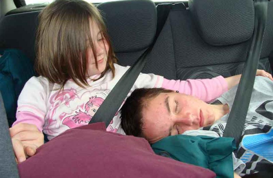 Photo of son Sam. sleeping with his little sister Katherine watching over him - after family...