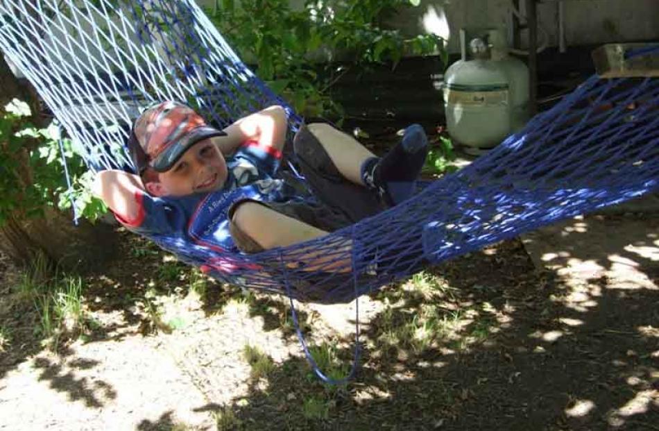 James Hanning (4 years) at his Grandparents crib at Otematata chilling out on his favourite...