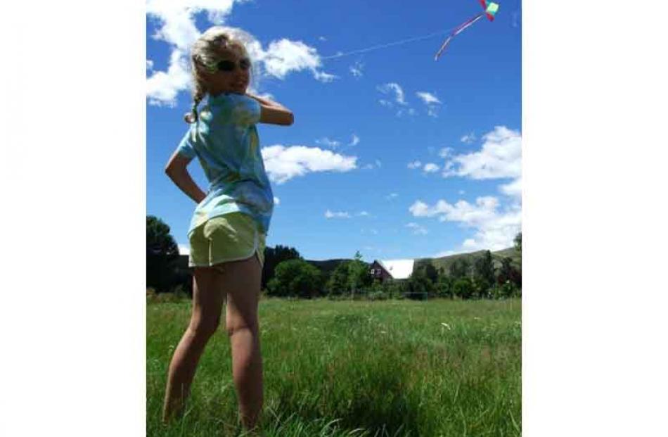 mm Kite Flying.JPG Up to the highest height . . . Bella Thomas (7) at her grandparents' holiday...